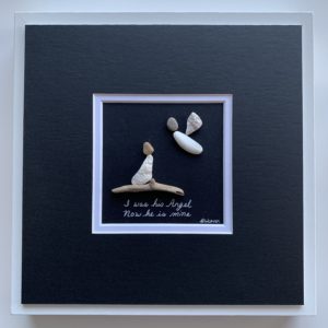 Male angel looking down on his beloved