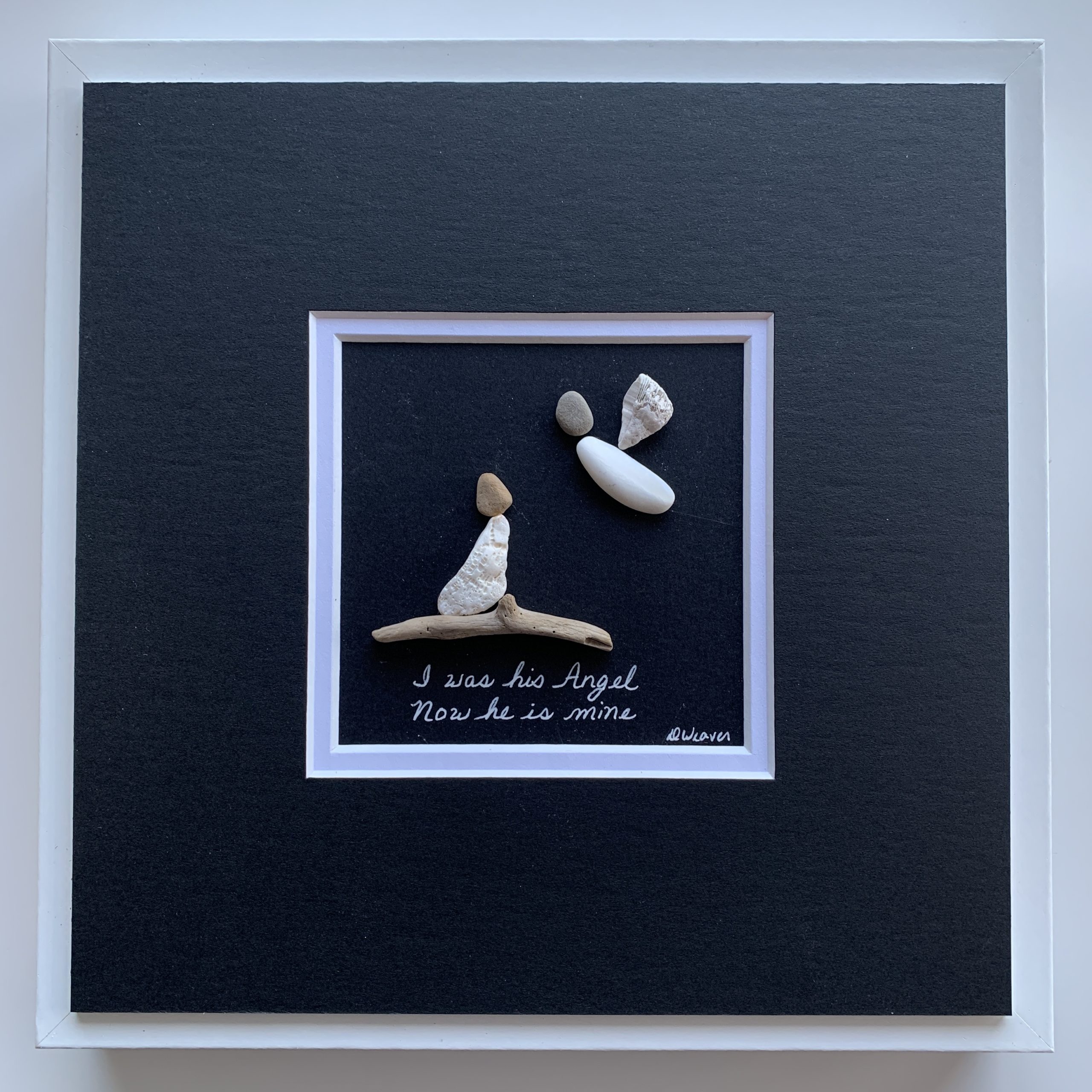 Male angel looking down on his beloved