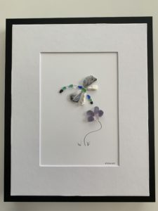 Dragonfly loving the flowers