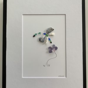 Dragonfly loving the flowers