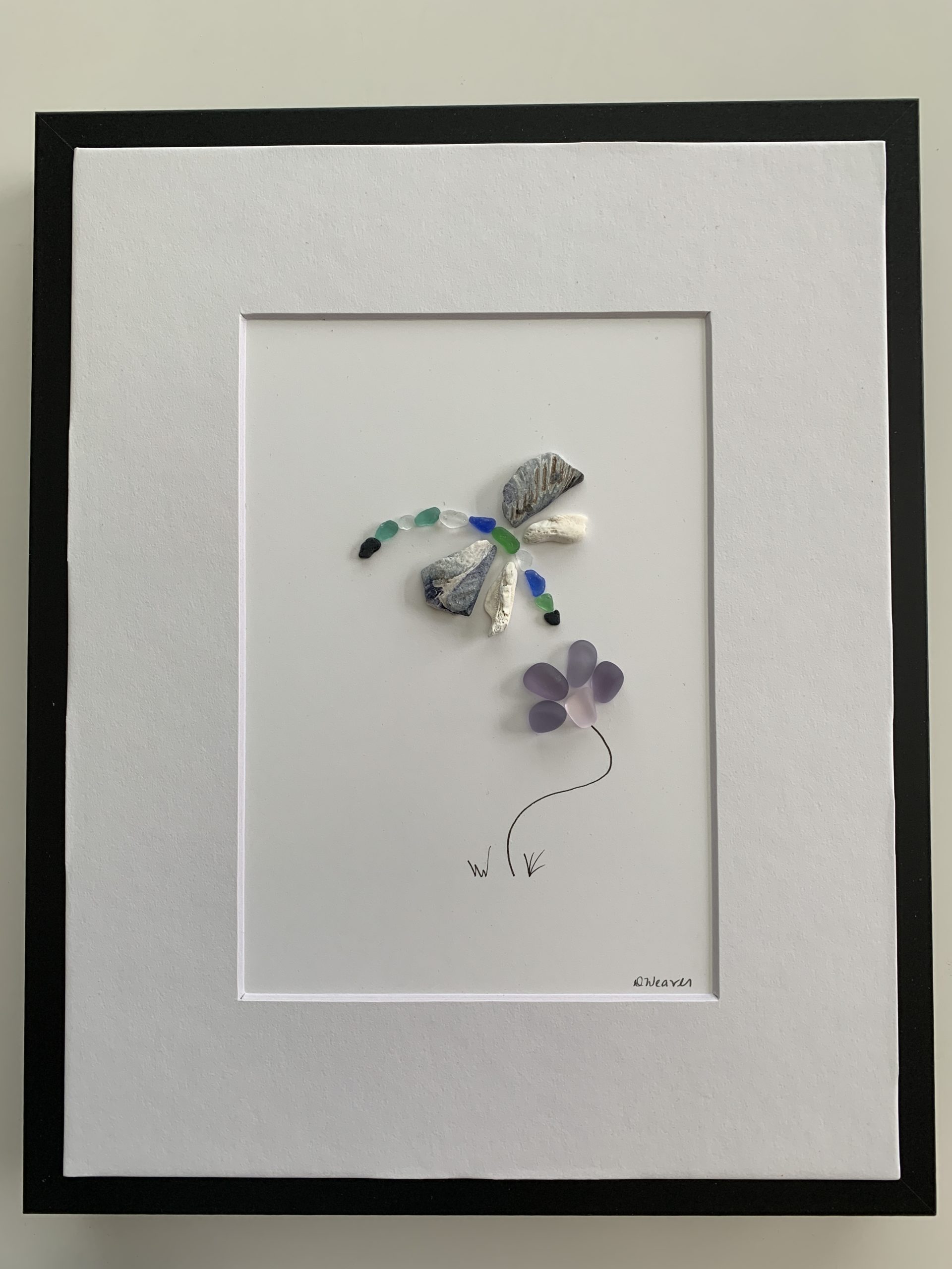 Dragonfly loving the flowers